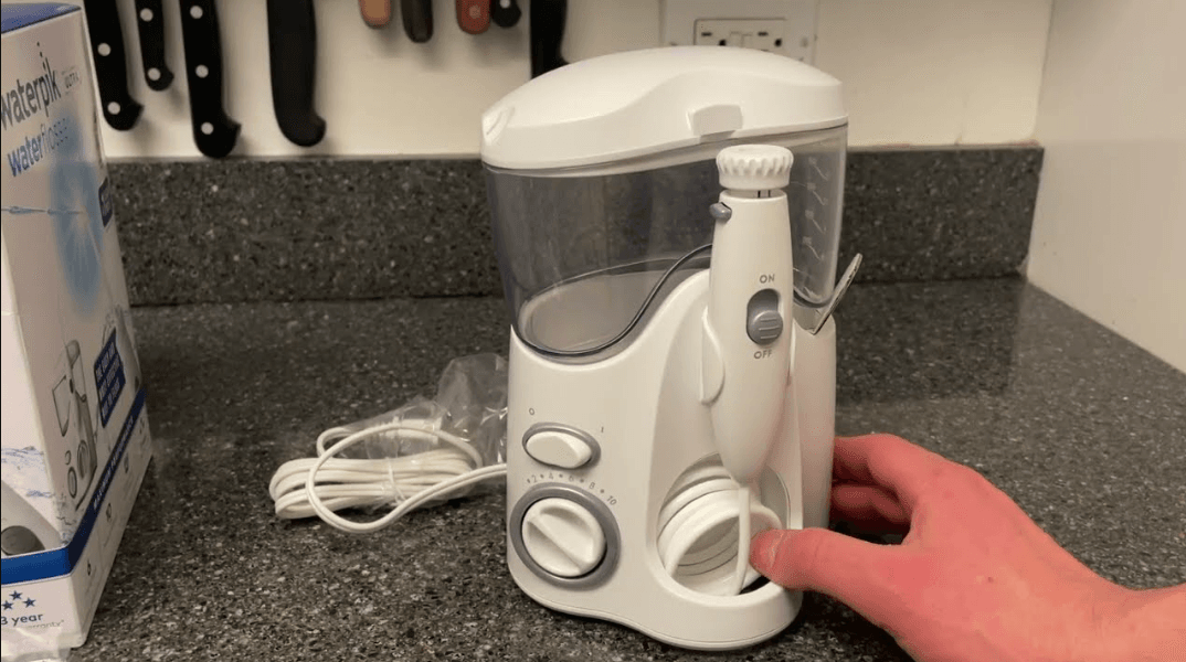 Waterpik WP-100 Water Flosser User Manual
