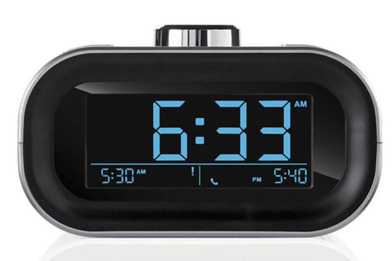 Brookstone Self-Setting Clock User Manual Brookstone Self-Setting Clock product image