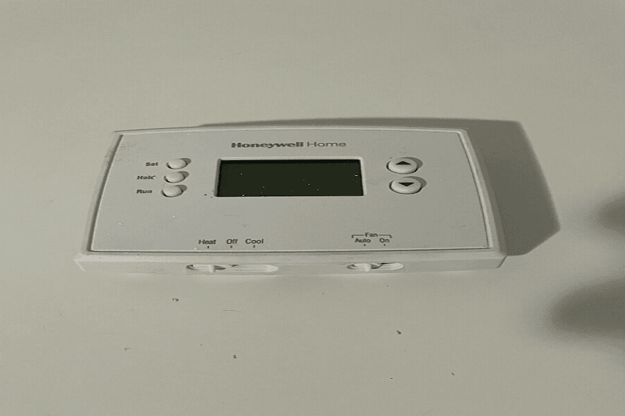 Honeywell RTHL2510 Programmable Thermostat Owners Manual