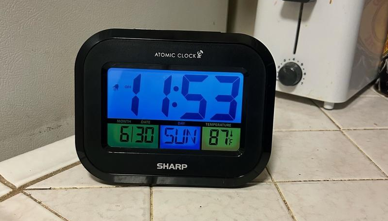 Sharp SPC900 Radio Controlled Atomic Thermo Clock User Manual