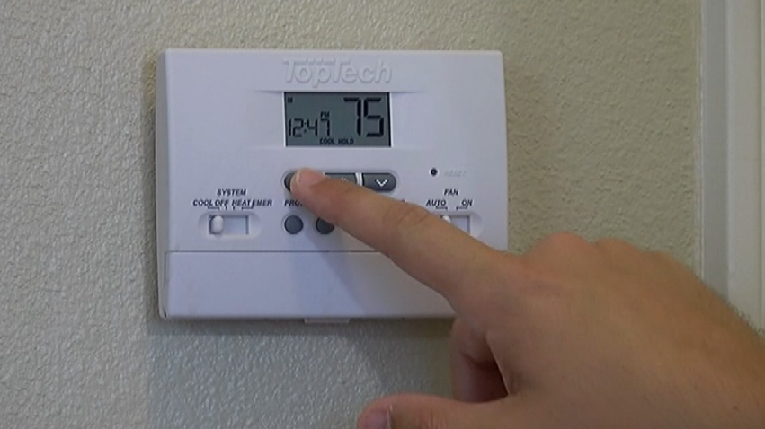 TopTech TT-P-411 Programmable Thermostat User Manual