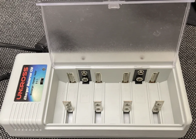 Uniross Universal 120 Battery Charger User Guide Uniross Universal 120 Battery Charger User Guide feat